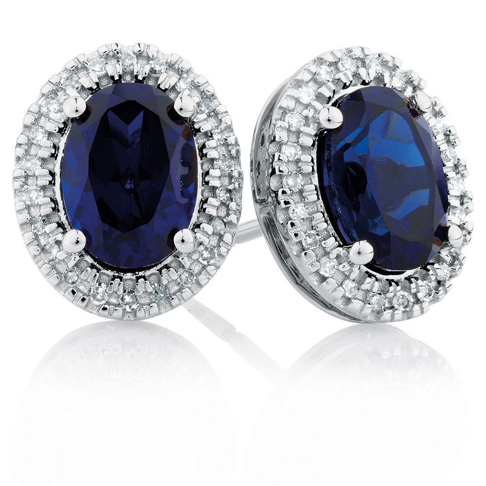 Stud Earrings with Created Sapphire & 1/10 Carat TW of Diamonds in 10kt White Gold