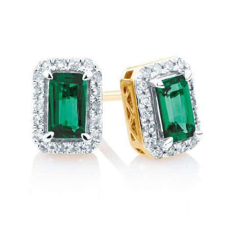 Stud Earrings with Created Emerald and 1/6 Carat TW of Diamonds in 10kt Yellow Gold