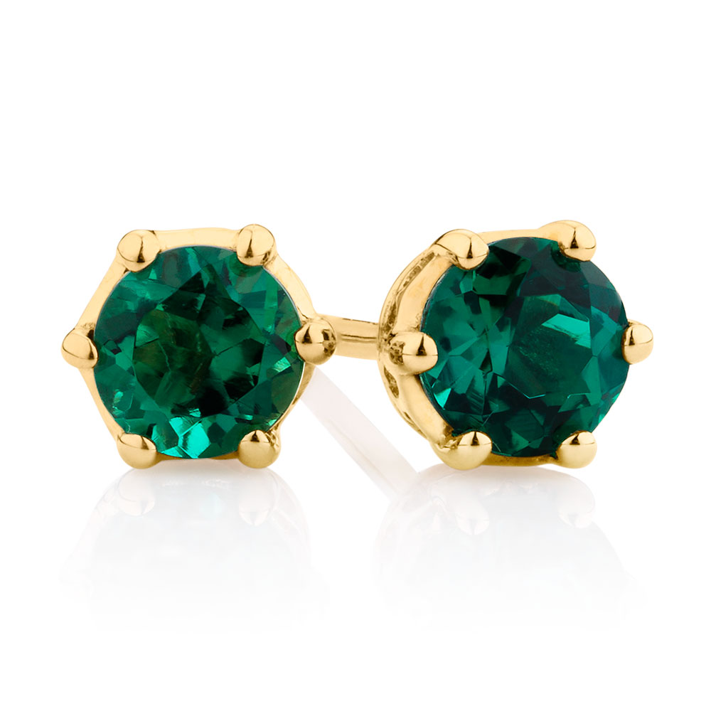Stud Earrings With Created Emerald In 10kt Yellow Gold