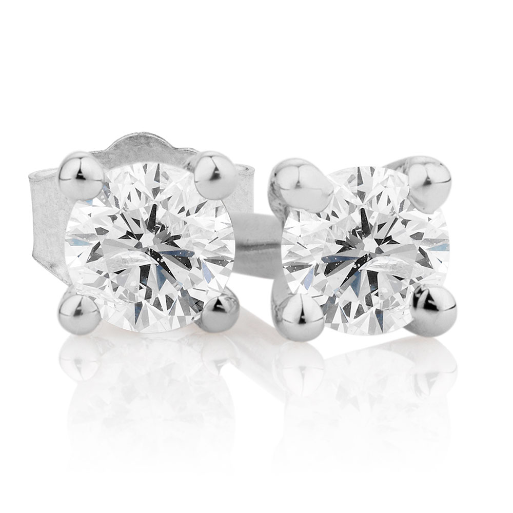 Stud Earrings With 1 10 Carat Tw Of Diamonds In 10kt White Gold